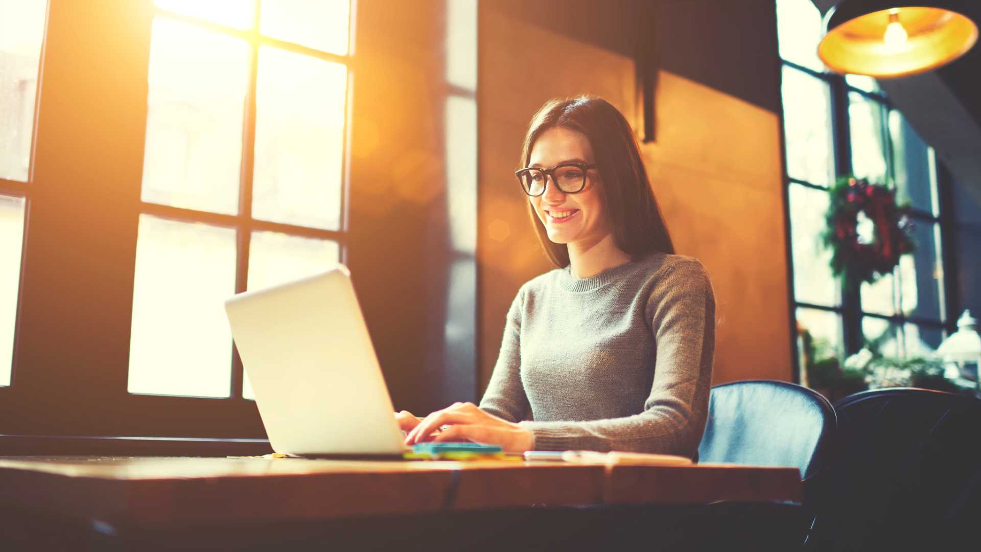 woman sitting with laptop