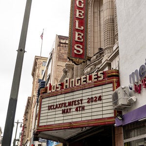 marquee and signage of the Los Angeles Theatre featuring uclax filmfest